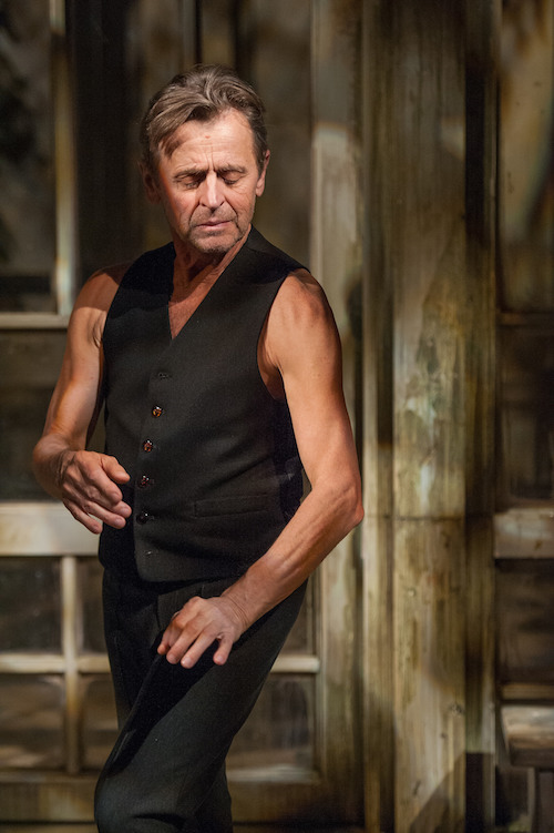 Baryshnikov with his eyes closed as his fingers appear to do a dance all of their own.